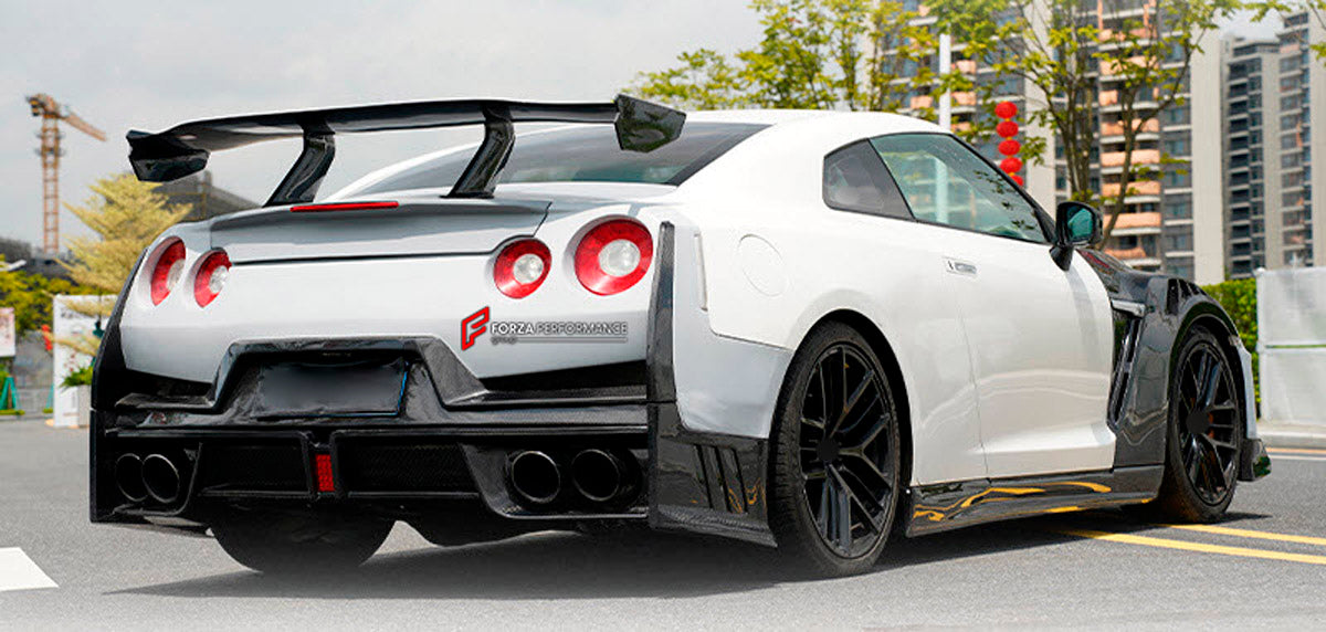DRY CARBON BODY KIT for Nissan GT-R R35 2007 - 2016
Set includes:

Front Bumper
Front Lip
Front Canards
Hood Bonnet
Side Skirts
Rear Spoiler Wing
Trunk Lid
Rear Diffuser
Rear Bumper
Material: Dry Carbon

NOTE: Professional installation is required.