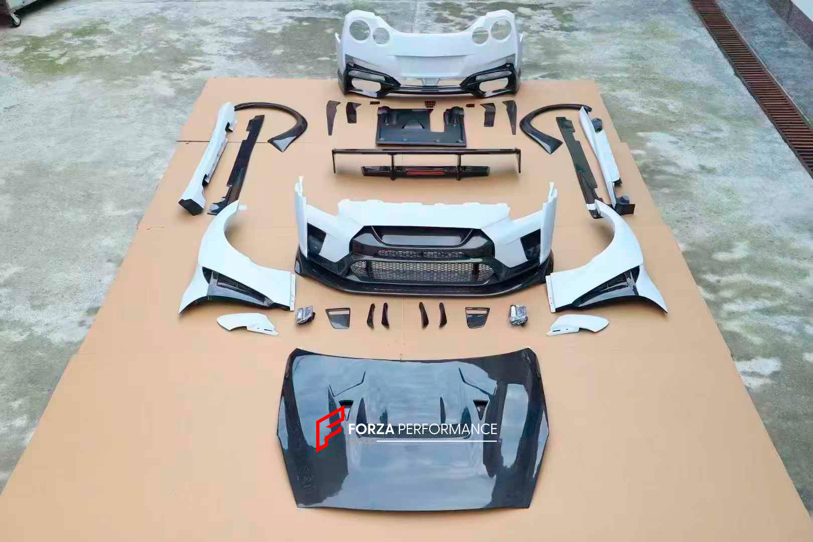 DRY CARBON BODY KIT for NISSAN GT-R R35 FACELIFT 2016 - 2023

Set includes:

Front Bumper Assembly
Front Fog Lights
Canards
Hood Bonnet
Fender Flares
Side Skirts
Spoiler
Rear Bumper Assembly

Material: Carbon

Note: Professional installation is required.
