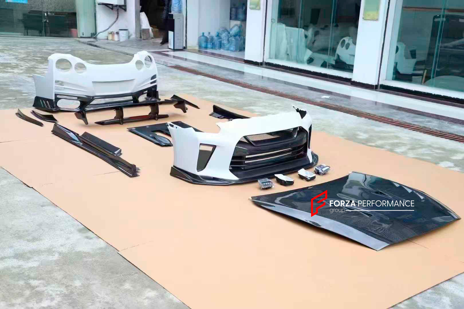 DRY CARBON BODY KIT for NISSAN GT-R R35 FACELIFT 2016 - 2023

Set includes:

Front Bumper Assembly
Front Fog Lights
Canards
Hood Bonnet
Fender Flares
Side Skirts
Spoiler
Rear Bumper Assembly

Material: Carbon

Note: Professional installation is required.
