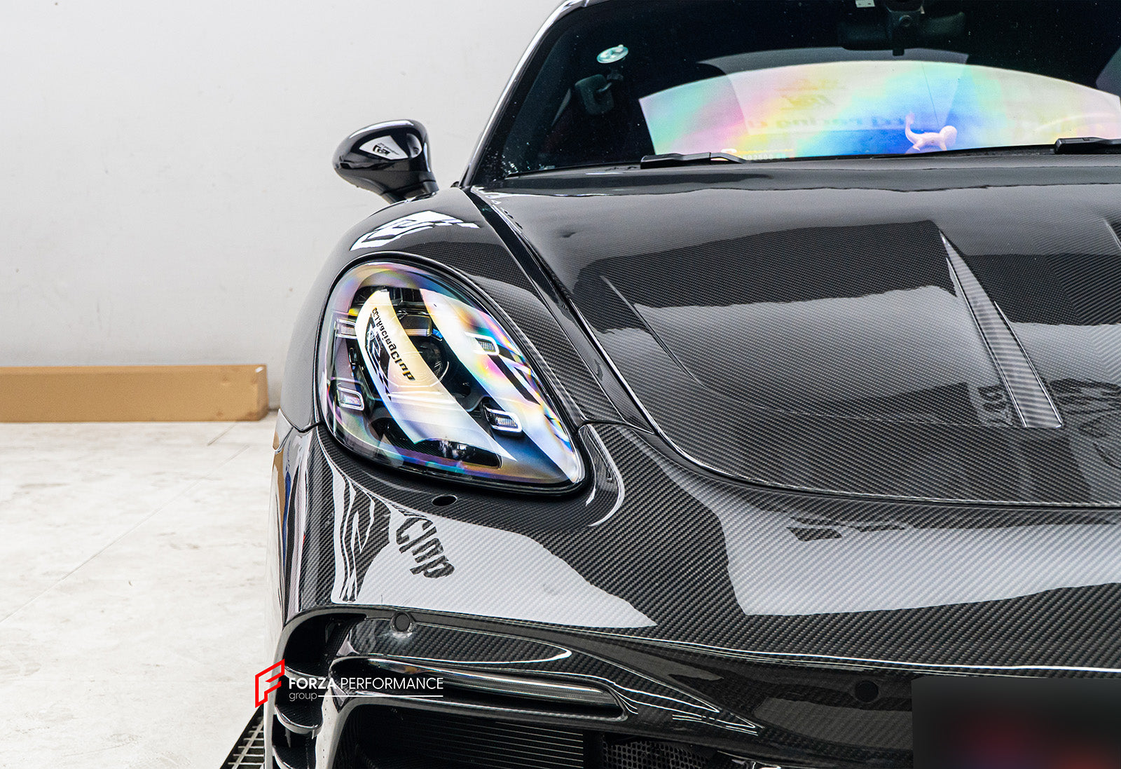 DRY CARBON BODY KIT FOR PORCHE 718 982 2016+

Set includes:

Front Lip
Front Bumper
Hood / Bonnet
Front Fenders
Side Skirts
Rear Diffuser
Exhaust tips

Material: Dry carbon + Fiberglass + Stainless steel

NOTE: Professional installation is required.