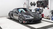 DRY CARBON BODY KIT FOR PORCHE 718 982 2016+

Set includes:

Front Lip
Front Bumper
Hood / Bonnet
Front Fenders
Side Skirts
Rear Diffuser
Exhaust tips

Material: Dry carbon + Fiberglass + Stainless steel

NOTE: Professional installation is required.