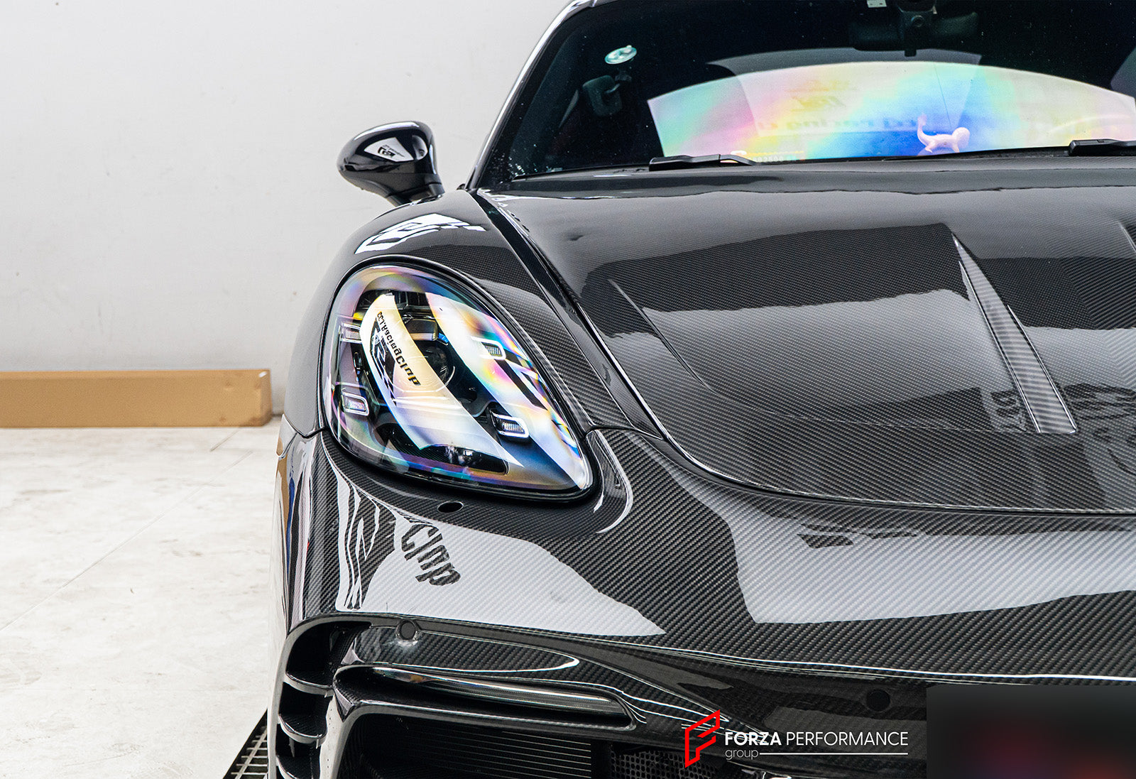 DRY CARBON BODY KIT FOR PORCHE 718 982 2016+

Set includes:

Front Lip
Front Bumper
Hood / Bonnet
Front Fenders
Side Skirts
Rear Diffuser
Exhaust tips

Material: Dry carbon + Fiberglass + Stainless steel

NOTE: Professional installation is required.