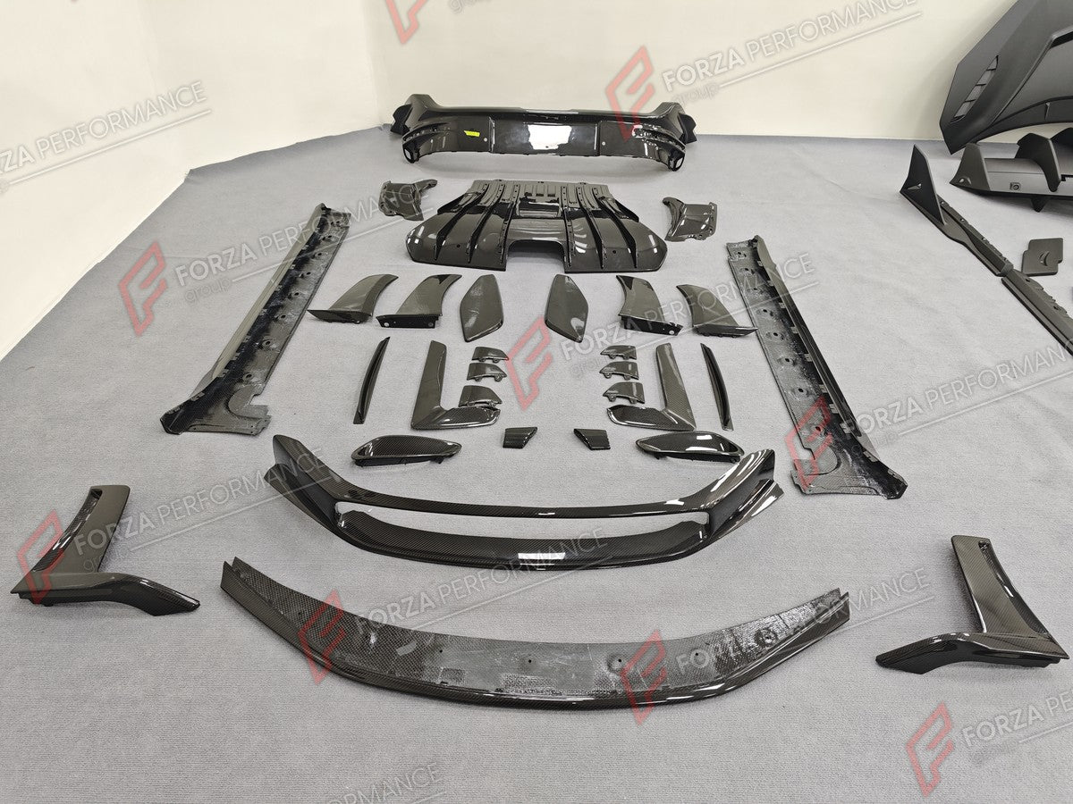 DRY CARBON BODY KIT for PORSCHE 911 992.1 GT3 RS 2022 - 2025 FORZA PERFORMANCE custom fit OEM Style

Set includes:
Front Lip
Front Bumper Splitter
Front Bumper Canards
Front Bumper Air Intake Trims
Front Fender Trims
Side Skirts
Side Air Intake Trims
Rear Bumper
Rear Diffuser
Exhaust Tip Surrounds

Material: Dry Carbon

NOTE: Professional installation is required.