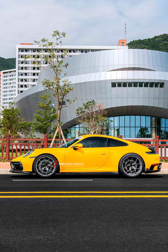 DRY CARBON BODY KIT FOR PORSCHE 911 992 CARRERA 2019+

Set includes:

Front Lip
Front Upper Lip
Front Vent Cover
Hood
Side Skirts

Rear Decklid Spoiler
Rear Diffuser

Material: Dry Carbon

NOTE: Professional installation is required

Contact us for pricing

Payment ►
Visa
Mastercard
PayPal with a credit card (add 4.4% at checkout)
Payoneer

Shipment ►

By express DHL/UPS/TNT/FedEx
To the local international airport
Special line by air
Special line by the sea
To Europe and the UK by train

Please let us know