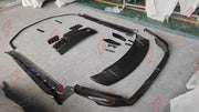 DRY CARBON BODY KIT for PORSCHE 911 992 GT3 2021+ FORZA PERFORMANCE custom fit OEM Style

Set includes:
Front Lip
Side Skirts
Rear Spoiler Wing
Rear Diffuser

Material: Dry Carbon

NOTE: Professional installation is required.