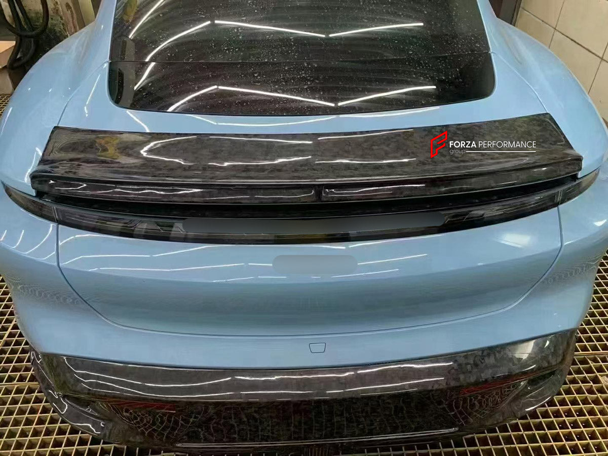DRY CARBON BODY KIT for PORSCHE TAYCAN J1 2020 - 2024 FORZA PERFORMANCE custom fit MS Style

Set includes:
Front Lip
Front Bumper Center Trim
Headlight Inserts
Side Mirror Covers
Body Side Door Moldings
Side Skirts
Ducktail Spoiler
Rear Diffuser

Material: Dry Carbon, Carbon

NOTE: Professional installation is required.
