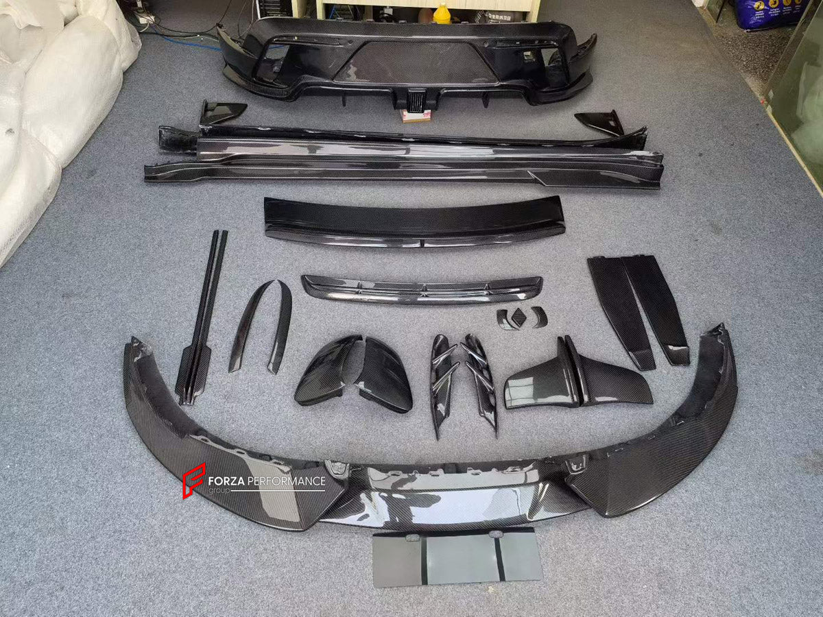 DRY CARBON BODY KIT for PORSCHE TAYCAN J1 2020 - 2024 FORZA PERFORMANCE custom fit MS Style

Set includes:
Front Lip
Front Bumper Center Trim
Headlight Inserts
Side Mirror Covers
Body Side Door Moldings
Side Skirts
Ducktail Spoiler
Rear Diffuser

Material: Dry Carbon, Carbon

NOTE: Professional installation is required.
