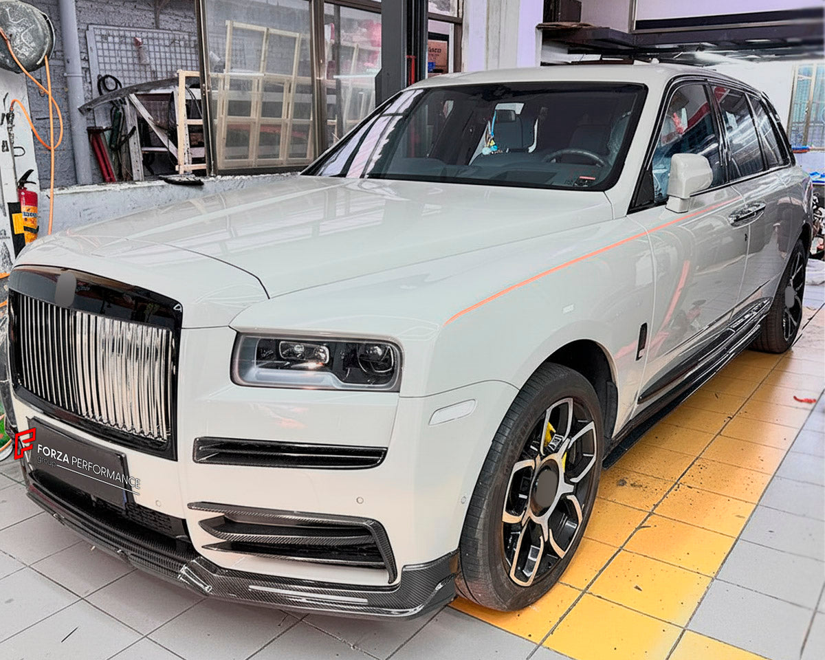 DRY CARBON BODY KIT for Rolls Royce Cullinan 2018 - 2024
Set includes:

Front Lip
Front Bumper Air Vent Trims
Side Skirts
Roof Spoiler
Ducktail Spoiler
Rear Bumper
Rear Bumper Fins
Rear Diffuser
Material: Dry Carbon

NOTE: Professional installation is required.