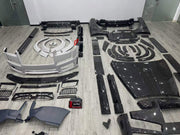 DRY CARBON BODY KIT for ROLLS-ROYCE CULLINAN 2018+ FORZA PERFORMANCE custom fit Mansory Style, 1016 Industries Style

Set includes:
Front Lip
Front Bumper
Front Grille
Headlights
Hood Bonnet
Side Fender Vents
Fender Flares
Body Side Door Moldings
Side Skirts
Roof Spoiler
Ducktail Spoiler
Rear Bumper
Rear Diffuser
Exhaust Tips

Material: Dry Carbon

NOTE: Professional installation is required.