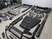 DRY CARBON BODY KIT for ROLLS-ROYCE CULLINAN 2018+ FORZA PERFORMANCE custom fit Mansory Style, 1016 Industries Style

Set includes:
Front Lip
Front Bumper
Front Grille
Headlights
Hood Bonnet
Side Fender Vents
Fender Flares
Body Side Door Moldings
Side Skirts
Roof Spoiler
Ducktail Spoiler
Rear Bumper
Rear Diffuser
Exhaust Tips

Material: Dry Carbon

NOTE: Professional installation is required.