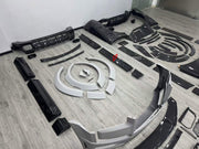DRY CARBON BODY KIT for ROLLS-ROYCE CULLINAN 2018+ FORZA PERFORMANCE custom fit Mansory Style, 1016 Industries Style

Set includes:
Front Lip
Front Bumper
Front Grille
Headlights
Hood Bonnet
Side Fender Vents
Fender Flares
Body Side Door Moldings
Side Skirts
Roof Spoiler
Ducktail Spoiler
Rear Bumper
Rear Diffuser
Exhaust Tips

Material: Dry Carbon

NOTE: Professional installation is required.