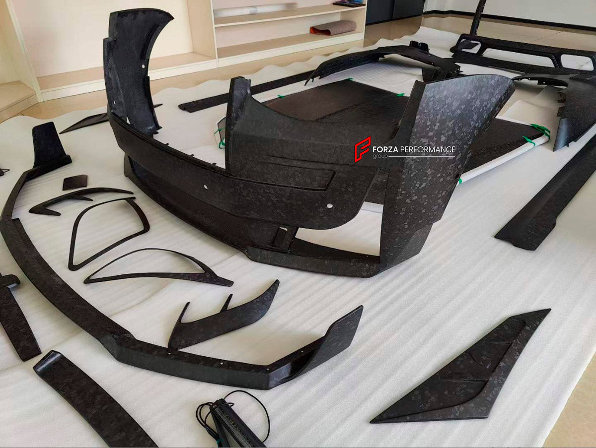 DRY CARBON BODY KIT for ROLLS-ROYCE GHOST II RR21 2020 - 2025

Set includes:
Front Lip
Front Bumper Assembly
Hood Bonnet
Front Fenders
Side Skirts
Ducktail Spoiler
Rear Diffuser
Exhaust Tips

Material: Dry Carbon

NOTE: Professional installation is required.