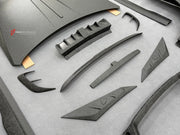 DRY CARBON BODY KIT for ROLLS ROYCE GHOST RR21 FACELIFT 2025+ FORZA PERFORMANCE Mansory+
Set includes:

Front Lip
Front Bumper Assembly
Hood Bonnet
Side Skirts
Ducktail Spoiler
Rear Bumper Assembly
Rear Diffuser
Material: Dry Carbon

NOTE: Professional installation is required.