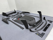 DRY CARBON BODY KIT for ROLLS ROYCE GHOST RR21 FACELIFT 2025+ FORZA PERFORMANCE Mansory+
Set includes:

Front Lip
Front Bumper Assembly
Hood Bonnet
Side Skirts
Ducktail Spoiler
Rear Bumper Assembly
Rear Diffuser
Material: Dry Carbon

NOTE: Professional installation is required.