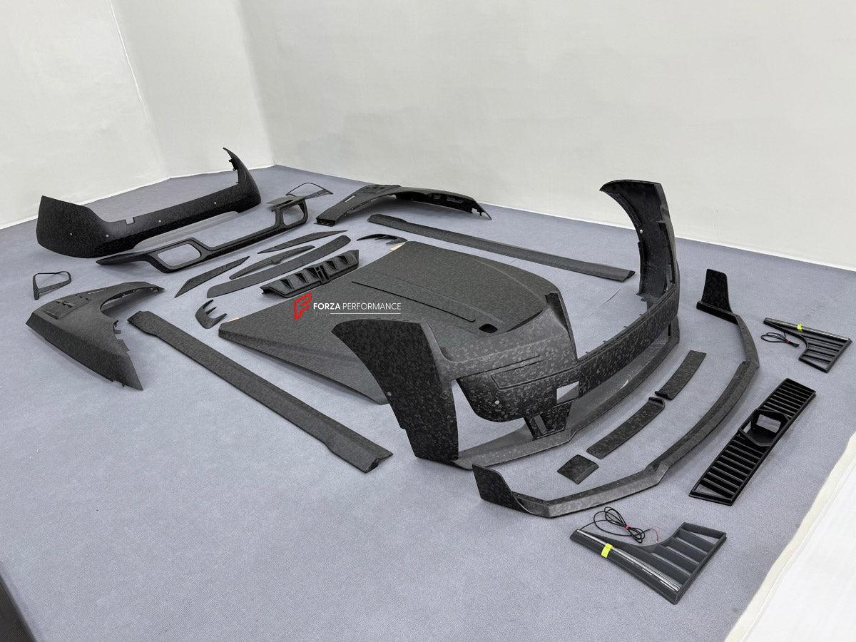 DRY CARBON BODY KIT for ROLLS ROYCE GHOST RR21 FACELIFT 2025+ FORZA PERFORMANCE Mansory+
Set includes:

Front Lip
Front Bumper Assembly
Hood Bonnet
Side Skirts
Ducktail Spoiler
Rear Bumper Assembly
Rear Diffuser
Material: Dry Carbon

NOTE: Professional installation is required.