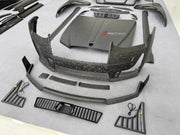 DRY CARBON BODY KIT for ROLLS ROYCE GHOST RR21 FACELIFT 2025+ FORZA PERFORMANCE Mansory+
Set includes:

Front Lip
Front Bumper Assembly
Hood Bonnet
Side Skirts
Ducktail Spoiler
Rear Bumper Assembly
Rear Diffuser
Material: Dry Carbon

NOTE: Professional installation is required.