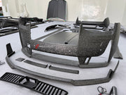 DRY CARBON BODY KIT for ROLLS ROYCE GHOST RR21 FACELIFT 2025+ FORZA PERFORMANCE Mansory+
Set includes:

Front Lip
Front Bumper Assembly
Hood Bonnet
Side Skirts
Ducktail Spoiler
Rear Bumper Assembly
Rear Diffuser
Material: Dry Carbon

NOTE: Professional installation is required.