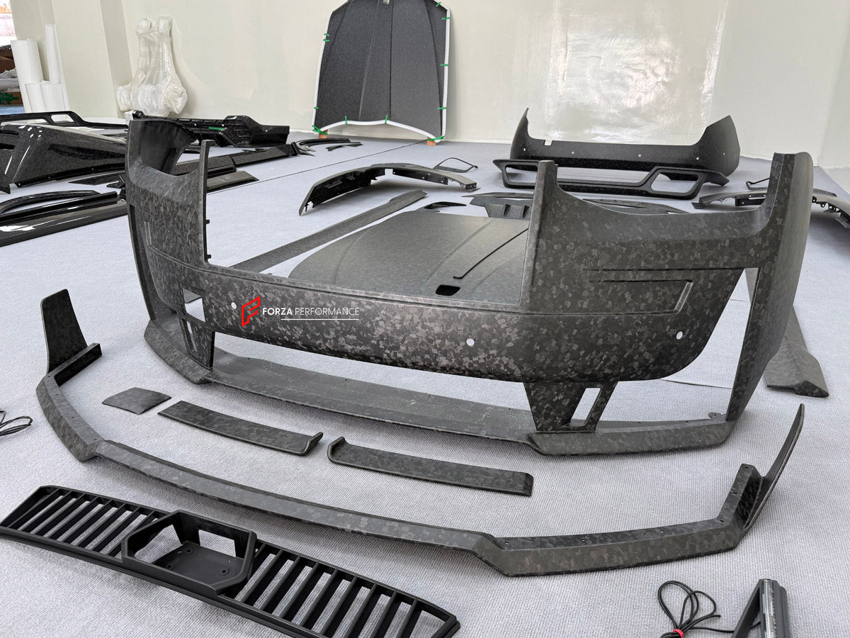 DRY CARBON BODY KIT for ROLLS ROYCE GHOST RR21 FACELIFT 2025+ FORZA PERFORMANCE Mansory+
Set includes:

Front Lip
Front Bumper Assembly
Hood Bonnet
Side Skirts
Ducktail Spoiler
Rear Bumper Assembly
Rear Diffuser
Material: Dry Carbon

NOTE: Professional installation is required.