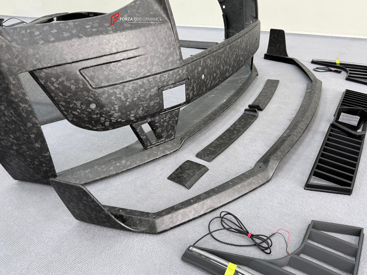 DRY CARBON BODY KIT for ROLLS ROYCE GHOST RR21 FACELIFT 2025+ FORZA PERFORMANCE Mansory+
Set includes:

Front Lip
Front Bumper Assembly
Hood Bonnet
Side Skirts
Ducktail Spoiler
Rear Bumper Assembly
Rear Diffuser
Material: Dry Carbon

NOTE: Professional installation is required.