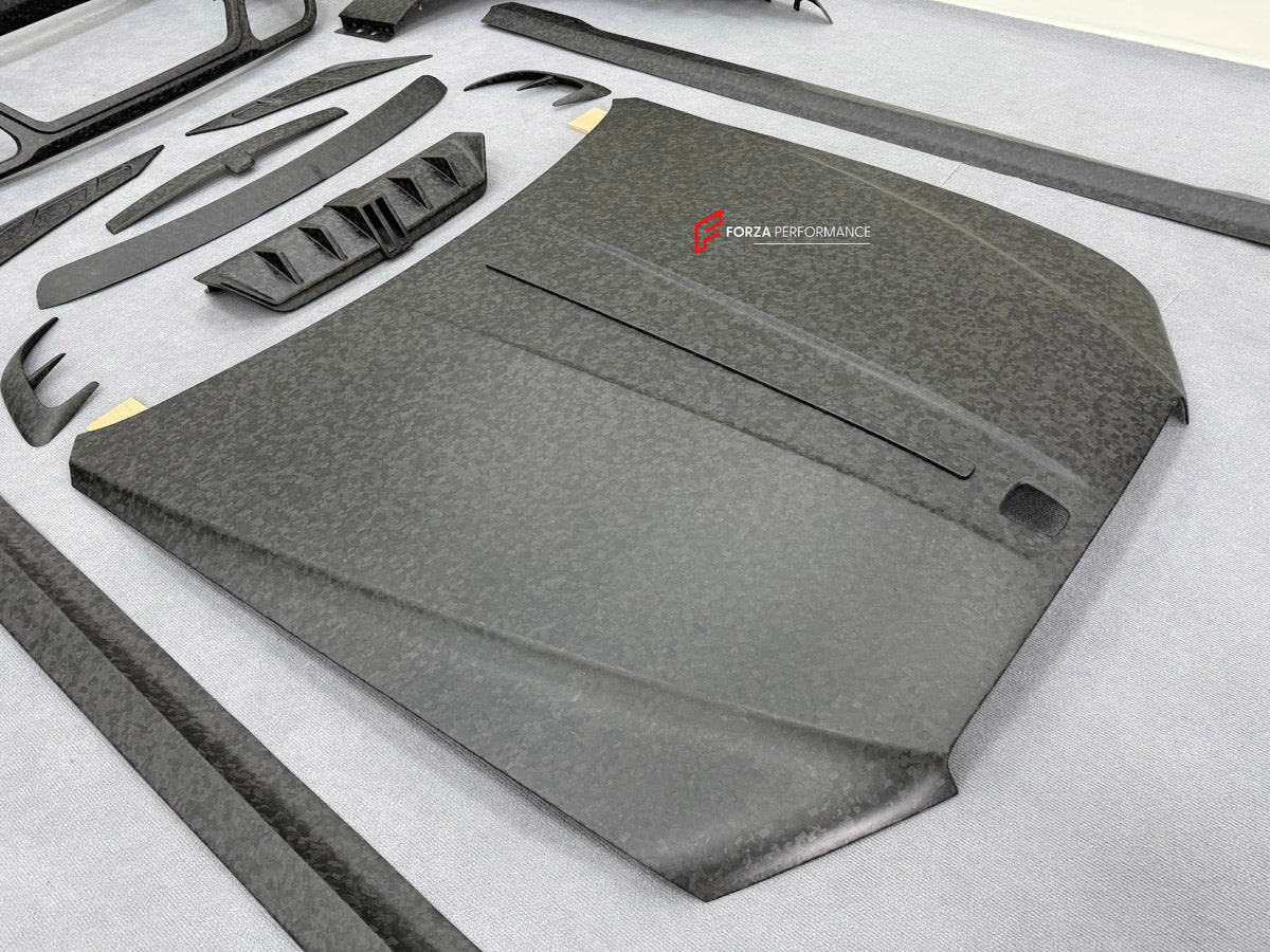 DRY CARBON BODY KIT for ROLLS ROYCE GHOST RR21 FACELIFT 2025+ FORZA PERFORMANCE Mansory+
Set includes:

Front Lip
Front Bumper Assembly
Hood Bonnet
Side Skirts
Ducktail Spoiler
Rear Bumper Assembly
Rear Diffuser
Material: Dry Carbon

NOTE: Professional installation is required.