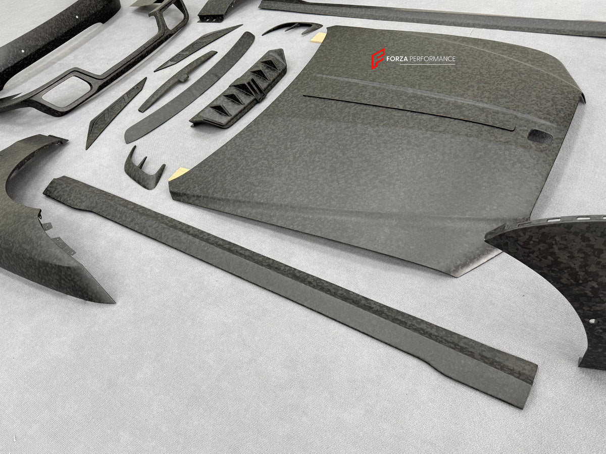 DRY CARBON BODY KIT for ROLLS ROYCE GHOST RR21 FACELIFT 2025+ FORZA PERFORMANCE Mansory+
Set includes:

Front Lip
Front Bumper Assembly
Hood Bonnet
Side Skirts
Ducktail Spoiler
Rear Bumper Assembly
Rear Diffuser
Material: Dry Carbon

NOTE: Professional installation is required.