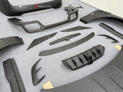 DRY CARBON BODY KIT for ROLLS ROYCE GHOST RR21 FACELIFT 2025+ FORZA PERFORMANCE Mansory+
Set includes:

Front Lip
Front Bumper Assembly
Hood Bonnet
Side Skirts
Ducktail Spoiler
Rear Bumper Assembly
Rear Diffuser
Material: Dry Carbon

NOTE: Professional installation is required.