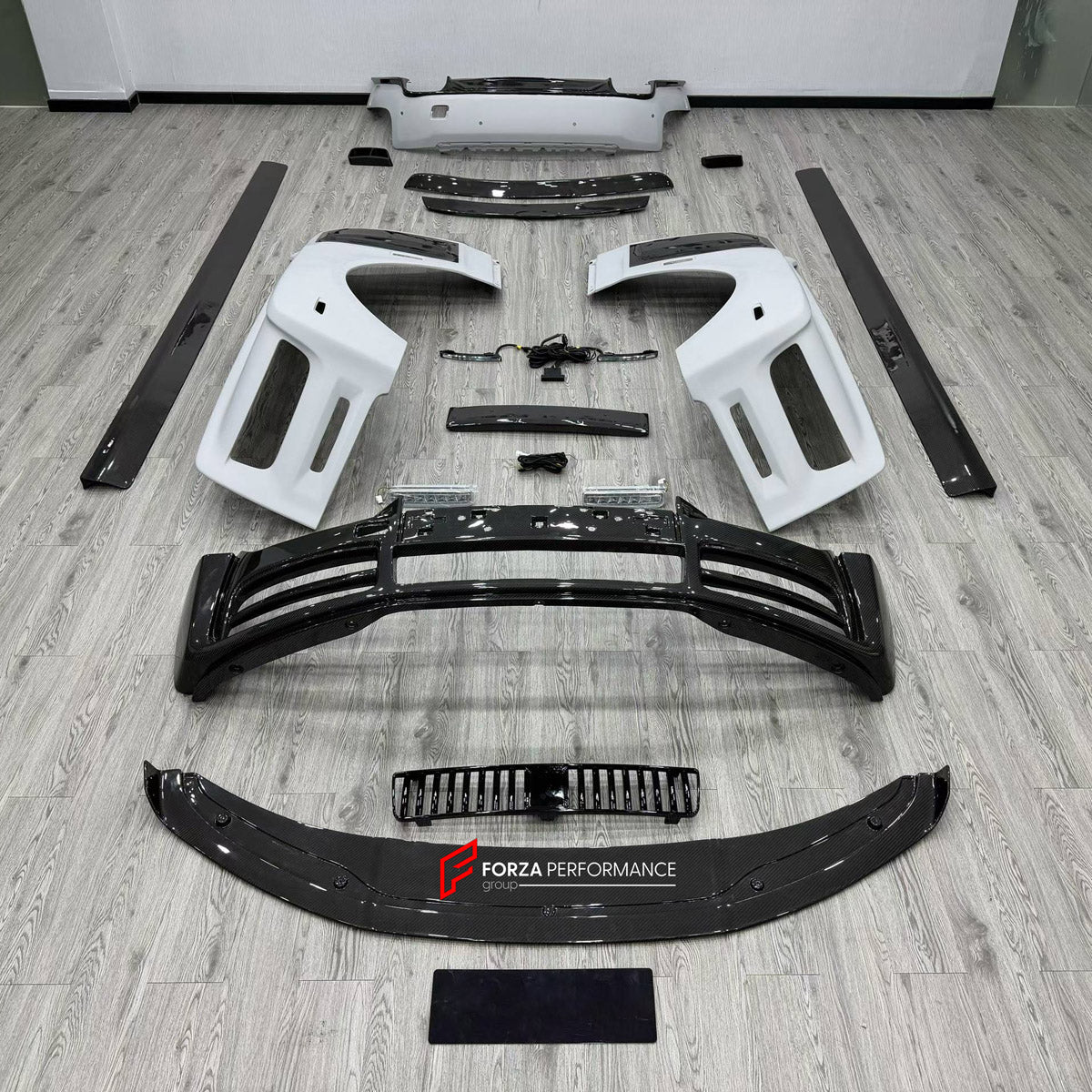 DRY CARBON BODY KIT for ROLLS-ROYCE PHANTOM VIII RR11 2017+ FORZA PERFORMANCE custom fit M Style

Set includes:
Front Lip
Front Bumper Assembly
Side Skirts
Ducktail Spoiler
Rear Bumper Assembly

Material: Dry Carbon

NOTE: Professional installation is required.