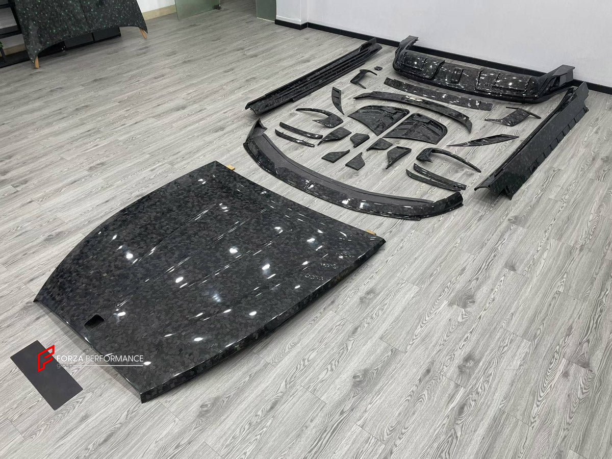 DRY CARBON BODY KIT for ROLLS-ROYCE SPECTRE 2023+ FORZA PERFORMANCE custom fit M Style

Set includes:
Front Lip
Front Bumper Canards
Hood Bonnet
Side Skirts
Rear Diffuser

Material: Dry Carbon, Carbon

NOTE: Professional installation is required.