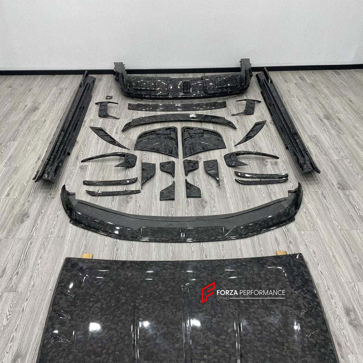DRY CARBON BODY KIT for ROLLS-ROYCE SPECTRE 2023+ FORZA PERFORMANCE custom fit M Style

Set includes:
Front Lip
Front Bumper Canards
Hood Bonnet
Side Skirts
Rear Diffuser

Material: Dry Carbon, Carbon

NOTE: Professional installation is required.