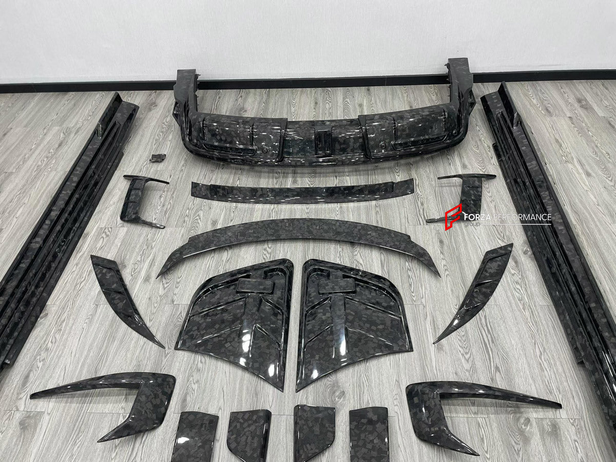 DRY CARBON BODY KIT for ROLLS-ROYCE SPECTRE 2023+ FORZA PERFORMANCE custom fit M Style

Set includes:
Front Lip
Front Bumper Canards
Hood Bonnet
Side Skirts
Rear Diffuser

Material: Dry Carbon, Carbon

NOTE: Professional installation is required.