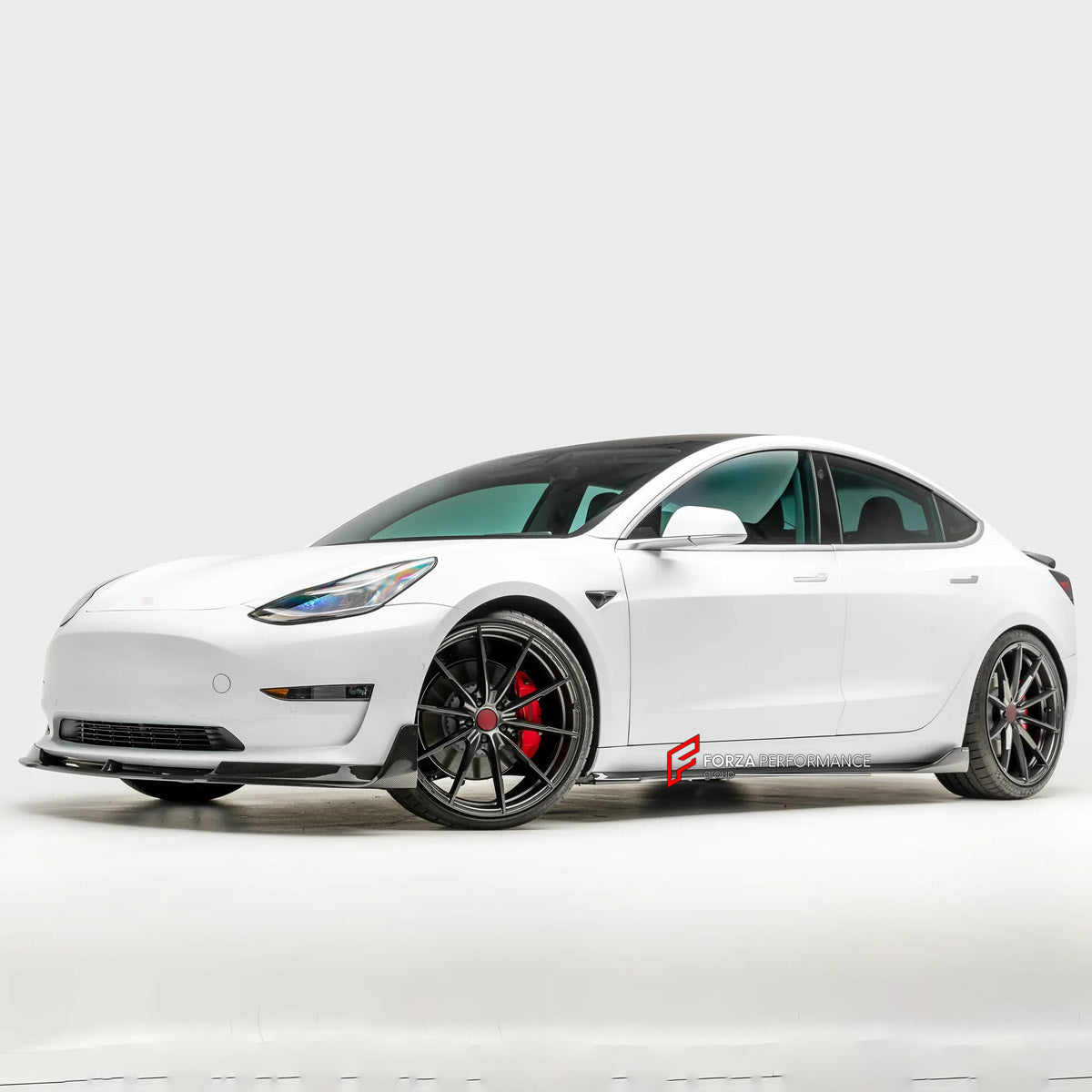 DRY CARBON BODY KIT for Tesla Model 3 V 2017 - 2023
Set includes:

Front Lip
Hood Bonnet
Side Skirts
Ducktail Spoiler
Rear Diffuser
Material: Carbon

NOTE: Professional installation is required.