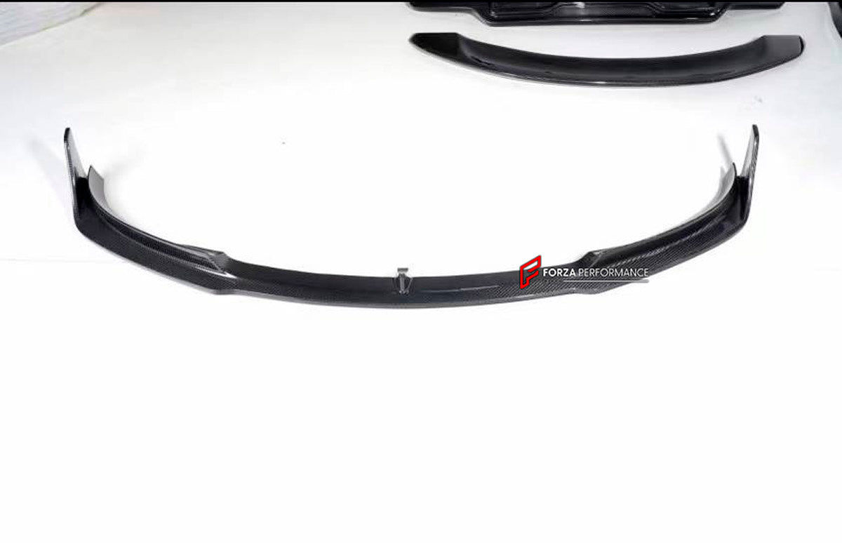 DRY CARBON BODY KIT for Tesla Model 3 V 2017 - 2023
Set includes:

Front Lip
Hood Bonnet
Side Skirts
Ducktail Spoiler
Rear Diffuser
Material: Carbon

NOTE: Professional installation is required.
