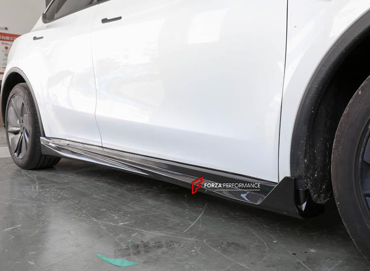 DRY CARBON BODY KIT for TESLA MODEL Y JUNIPER 2025+

Set includes:

Front Lip

Side Skirts

Rear Diffuser

Material: Plastic
