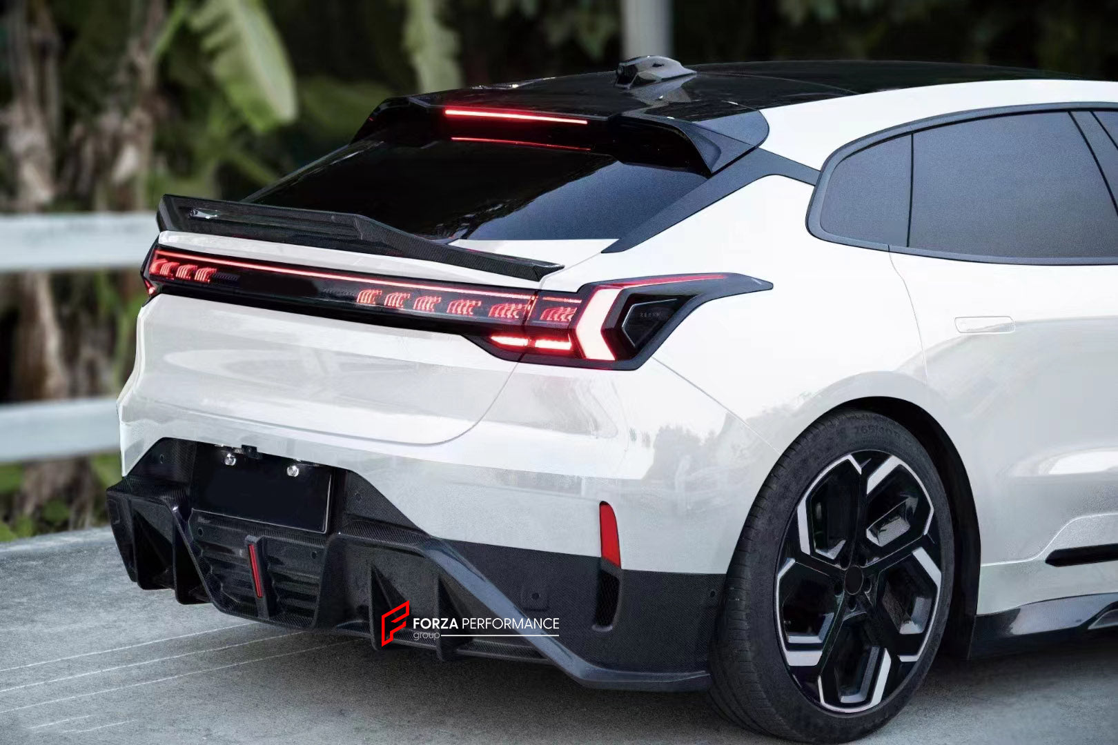 CARBON BODY KIT for ZEEKR 001 2021+

Set includes:
Front Lip
Front Bumper Trims
Side Skirts
Roof Spoiler
Rear Spoiler
Rear Diffuser&nbsp;

Material: Carbon fiber

Contact us for pricing

NOTE:

Professional installation is required