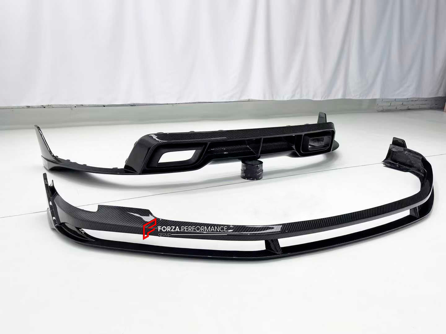 DRY CARBON AERO KIT for PORSCHE 911 992.1 TURBO S 2021 - 2025

Set includes:

Front Lip

Rear Diffuser

Exhaust Tips

Material: Dry Carbon

NOTE: Professional installation is required