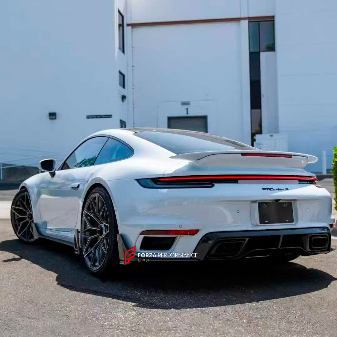 DRY CARBON AERO KIT for PORSCHE 911 992.1 TURBO S 2021 - 2025

Set includes:

Front Lip

Rear Diffuser

Exhaust Tips

Material: Dry Carbon

NOTE: Professional installation is required