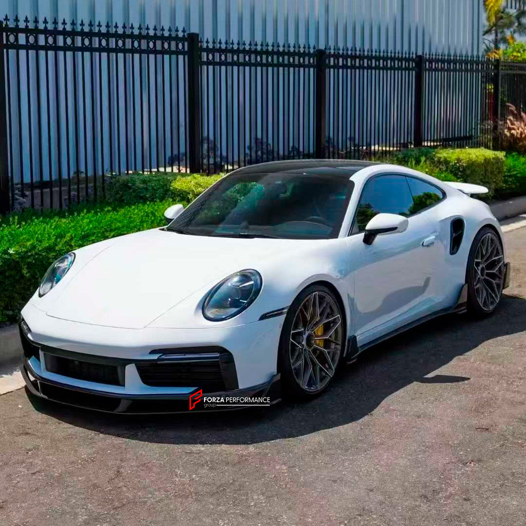 DRY CARBON AERO KIT for PORSCHE 911 992.1 TURBO S 2021 - 2025

Set includes:

Front Lip

Rear Diffuser

Exhaust Tips

Material: Dry Carbon

NOTE: Professional installation is required