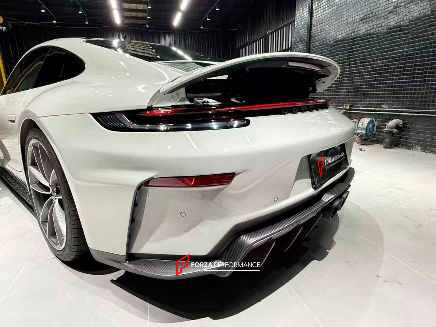 DRY CARBON CONVERSION BODY KIT for PORSCHE 911 992.1 CARRERA S2019 - 2023 to 992.2 GT3 TOURING

Set includes:

Front Bumper Assembly

Side Skirts

Engine Lid
Rear Bumper
Rear Diffuser
Muffler With Valves
Exhaust Tips

Material: Dry Carbon