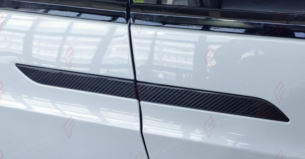 DRY CARBON DOOR HANDLE COVERS 4 PCS for TESLA MODEL X 2016 - 2023
Set includes:

Door Handle Covers (4 pcs/set)
Material: Dry Carbon

NOTE: Add-on type - installs over the original part. Professional installation is required.