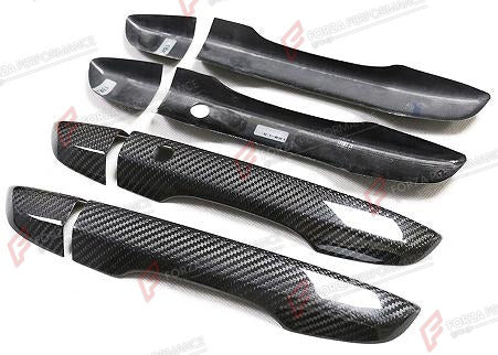 DRY CARBON DOOR HANDLE COVERS 8 PCS for HONDA CIVIC 10TH GEN FC FK 2016 - 2021
Set includes:

Door Handle Covers (8 pcs/set)
Material: Dry Carbon

NOTE: Specify door count and sensor option when ordering. Add-on type - installs over the original part. Professional installation is required.