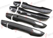 DRY CARBON DOOR HANDLE COVERS 8 PCS for HONDA CIVIC 10TH GEN FC FK 2016 - 2021
Set includes:

Door Handle Covers (8 pcs/set)
Material: Dry Carbon

NOTE: Specify door count and sensor option when ordering. Add-on type - installs over the original part. Professional installation is required.