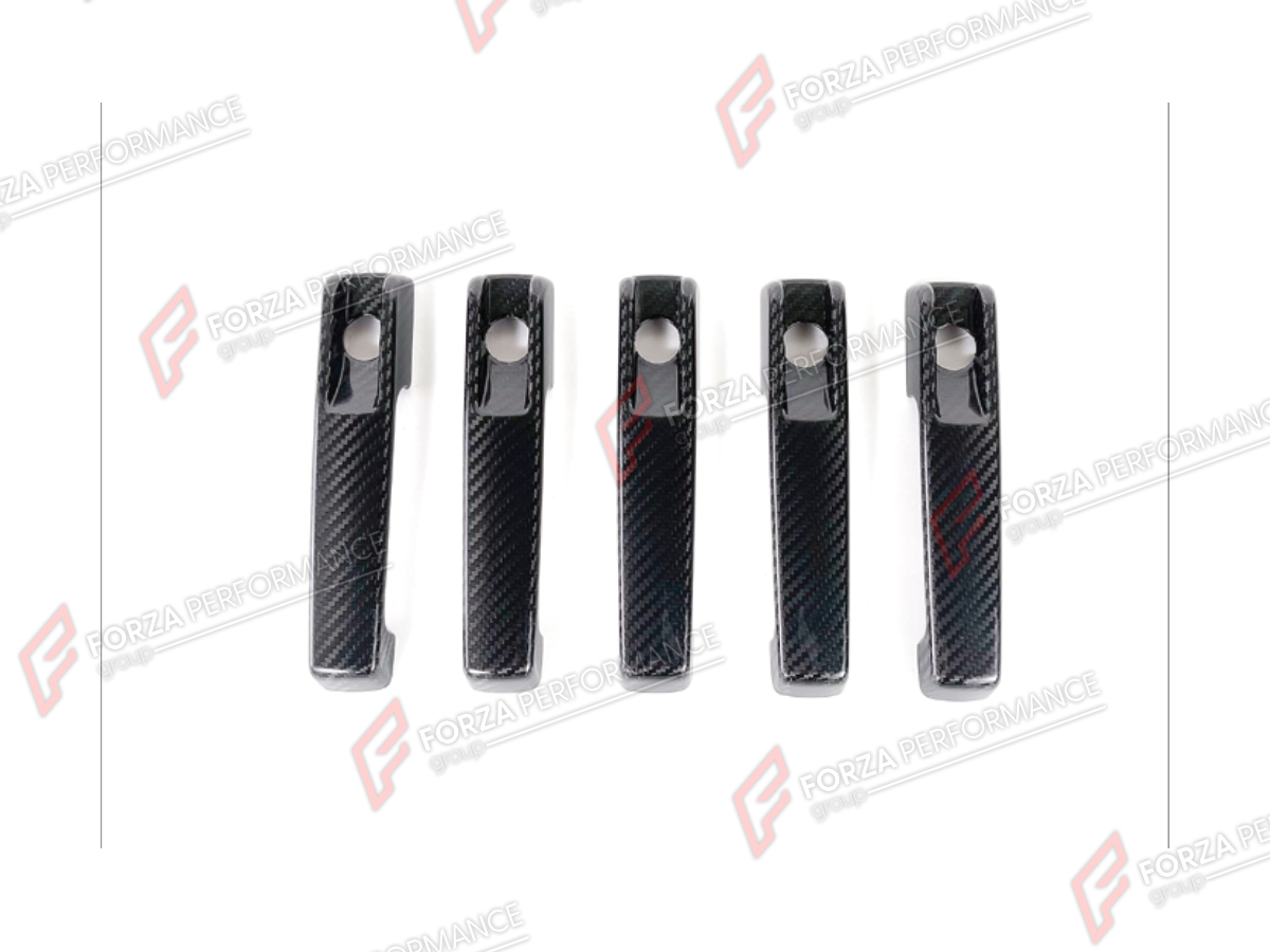 DRY CARBON DOOR HANDLE COVERS for MERCEDES-BENZ G-CLASS W463 2008 - 2018

Set includes:
Door Handle Covers

Material: Dry Carbon

NOTE: Professional installation is required.