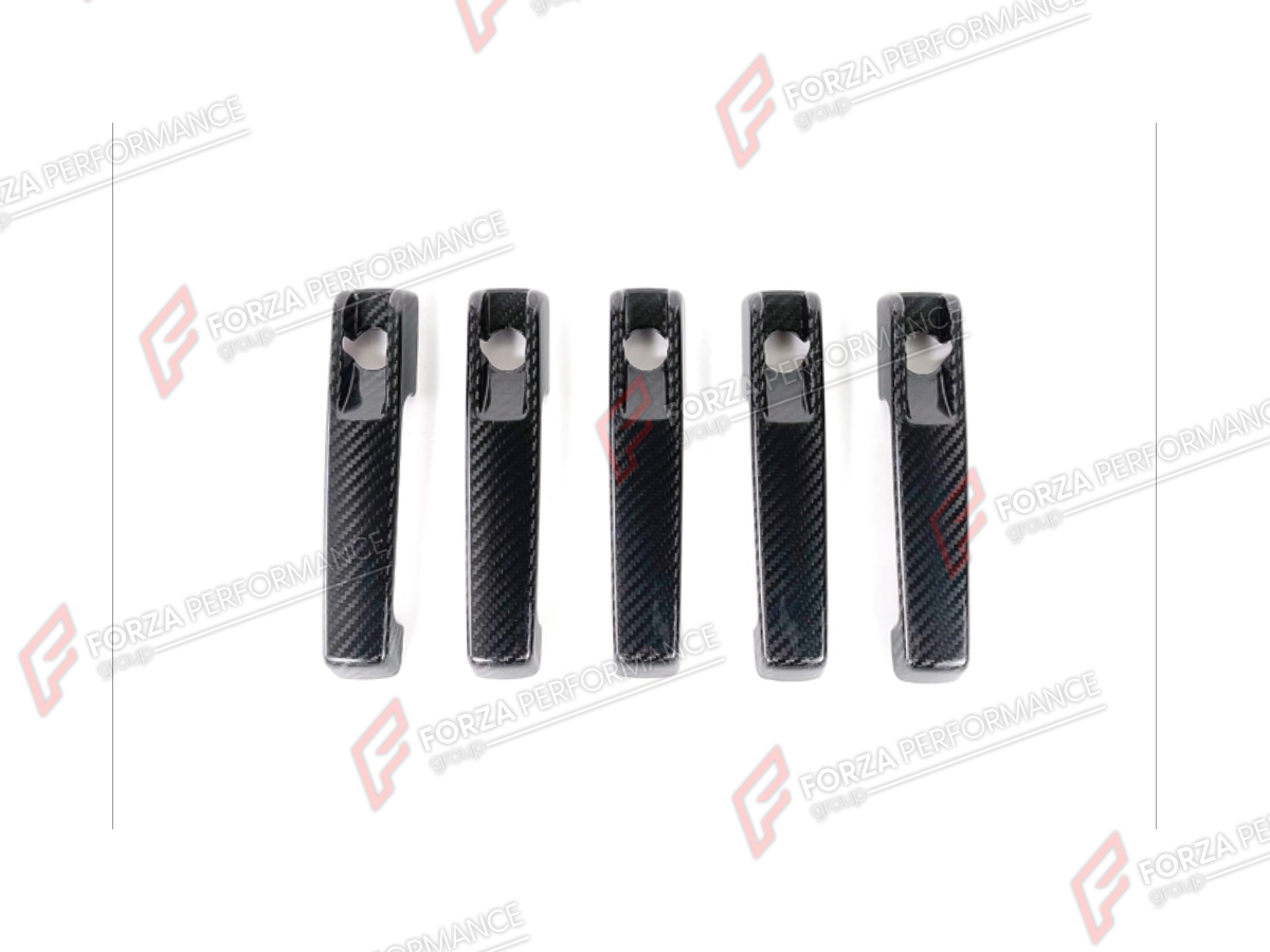 DRY CARBON DOOR HANDLE COVERS for MERCEDES-BENZ G-CLASS W464 2019 - 2024

Set includes:
Door Handle Covers

Material: Dry Carbon

NOTE: Professional installation is required.