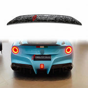 DRY CARBON DUCKTAIL SPOILER for FERRARI F12 BERLINETTA 2012 - 2017 FORZA PERFORMANCE custom fit DMC Style

Set includes:
Ducktail Spoiler

Material: Dry Carbon

NOTE: Professional installation is required.