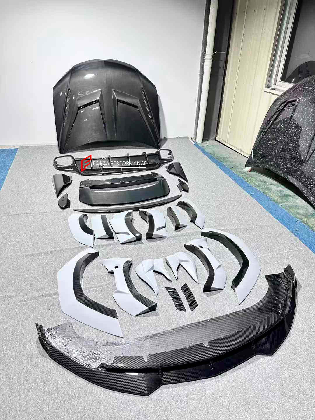 CARBON FIBER BODY KIT for LAMBORGHINI URUS S 2023-2024

Set includes:

Front Lip
Hood / Bonnet
Fender Flares
Roof Spoiler
Rear Spoiler
Rear Diffuser

Material: Carbon Fiber

NOTE: Professional installation is required.
