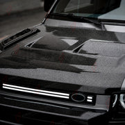 DRY CARBON FIBER BODY KIT for LAND ROVER DEFENDER 90 110 L663 2020+
Set includes:

Front Grille Trim
Hood Bonnet
Hood Vent Covers
Fender Flares
Side Storage Box
Spare Wheel Tire Cover
Steering Wheel
Interior Trim Kit
Roof Spoiler with Light
Material: Dry Carbon Fiber

NOTE: Professional installation is required.