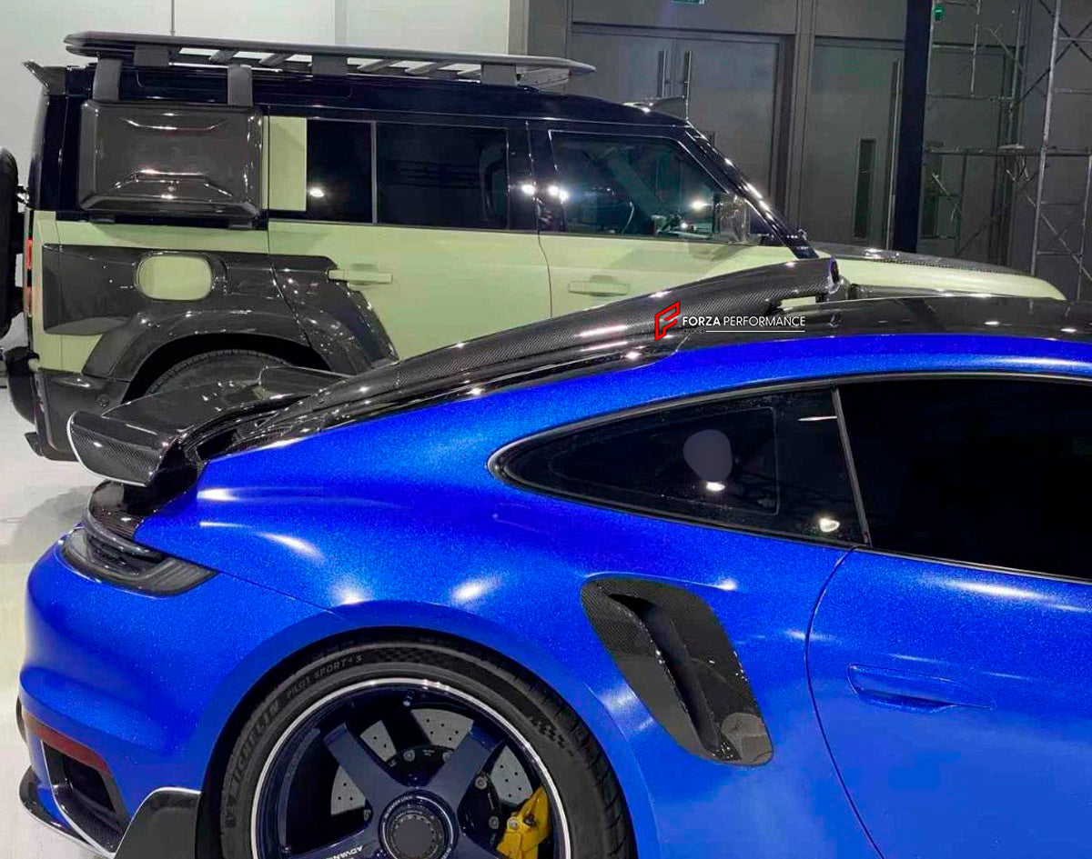 DRY CARBON FIBER F1 ROOF AIR INTAKE SPOILER for PORSCHE 911 992.1 TURBO 2019 - 2025

Set includes:

Roof Air Intake Spoiler
Material: Dry Carbon Fiber

NOTE: Professional installation is required.