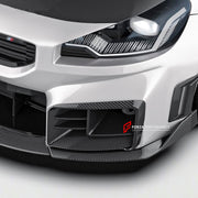 DRY CARBON FIBER FRONT CANARDS for BMW M2 G87 2023+
Set includes:

Front Canards
Material: Dry Carbon

NOTE: Professional installation is required.