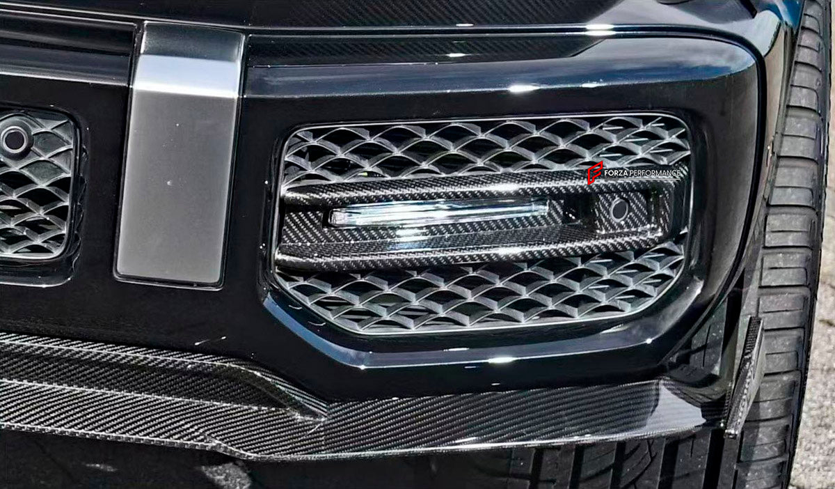 DRY CARBON Front Bumber Air Vents for Mercedes Benz W464 G63 2018 - 2024
Set includes:

Front Bumber Air Vents
Led Lights
Material: Dry Carbon

NOTE: Professional installation is required.