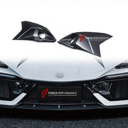 DRY CARBON FRONT BUMPER AIR INTAKE COVERS for LAMBORGHINI REVUELTO 2023+ FORZA PERFORMANCE custom fit Mansory Style

Set includes:
Front Bumper Air Intake Covers

Material: Dry Carbon

NOTE: Professional installation is required.